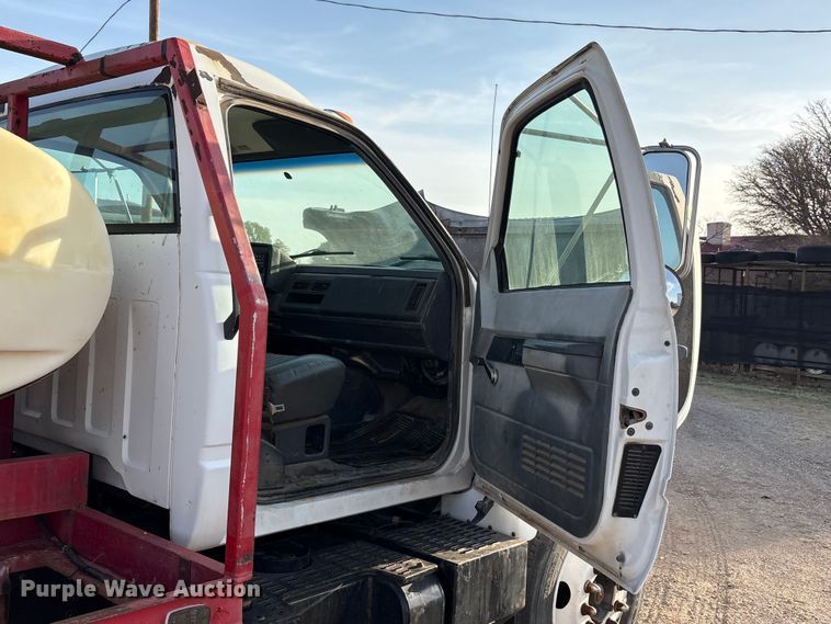 image for item FC2156 1999 GMC C7 flatbed truck