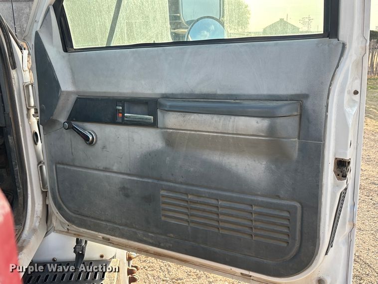 image for item FC2156 1999 GMC C7 flatbed truck
