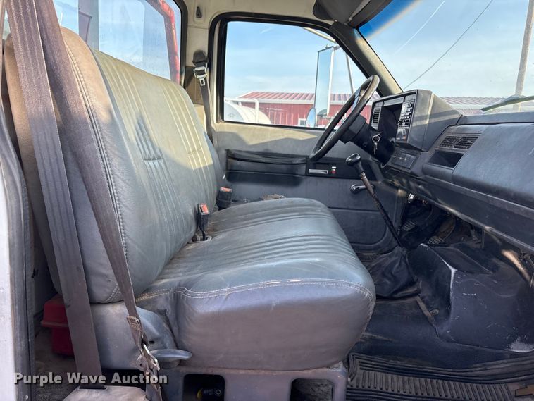 image for item FC2156 1999 GMC C7 flatbed truck