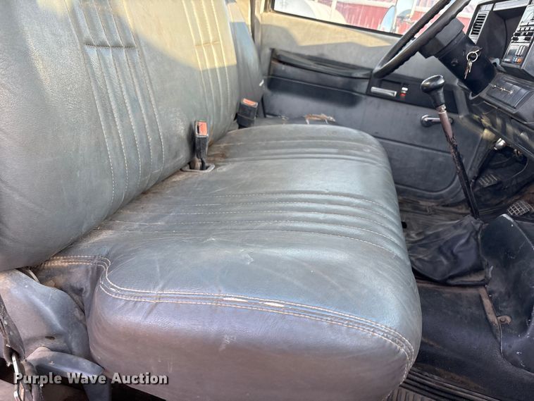 image for item FC2156 1999 GMC C7 flatbed truck