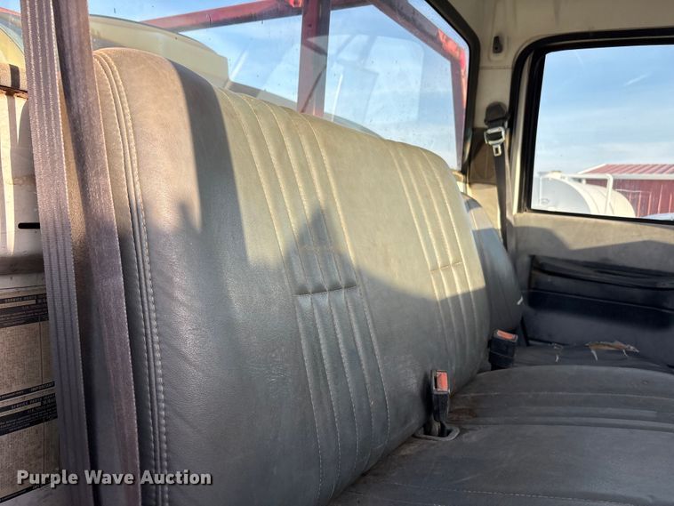 image for item FC2156 1999 GMC C7 flatbed truck