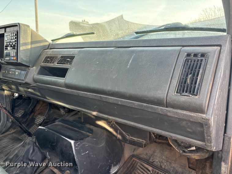image for item FC2156 1999 GMC C7 flatbed truck