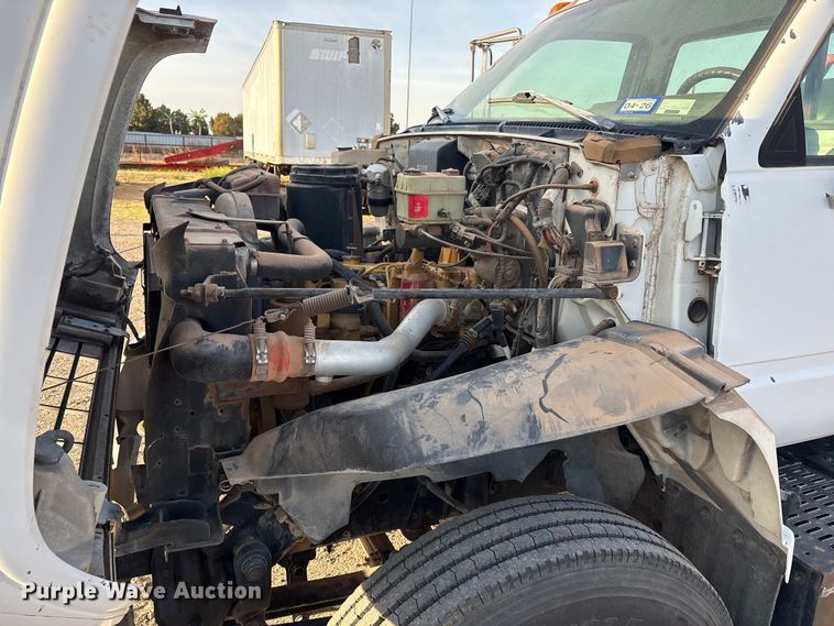 image for item FC2156 1999 GMC C7 flatbed truck