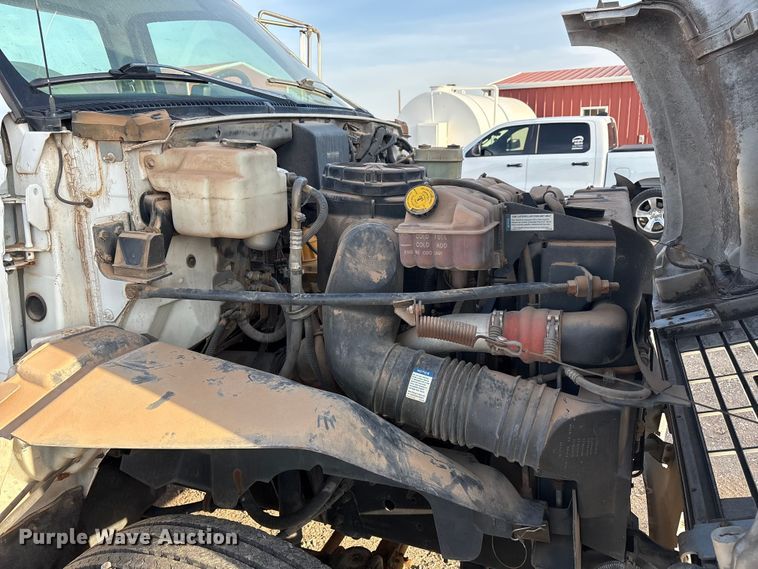 image for item FC2156 1999 GMC C7 flatbed truck