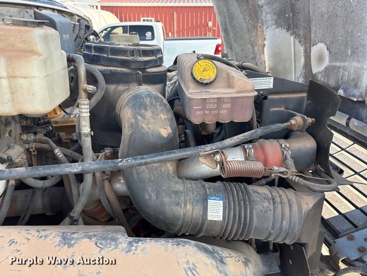image for item FC2156 1999 GMC C7 flatbed truck