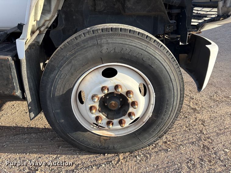 image for item FC2156 1999 GMC C7 flatbed truck