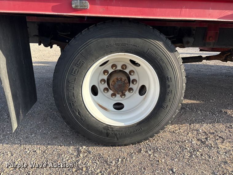 image for item FC2156 1999 GMC C7 flatbed truck