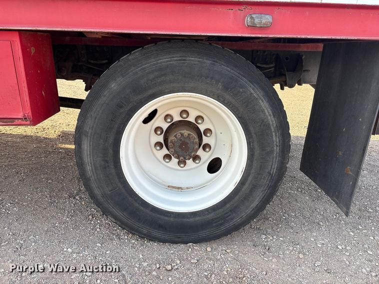 image for item FC2156 1999 GMC C7 flatbed truck