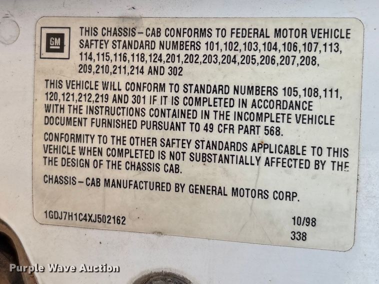 image for item FC2156 1999 GMC C7 flatbed truck