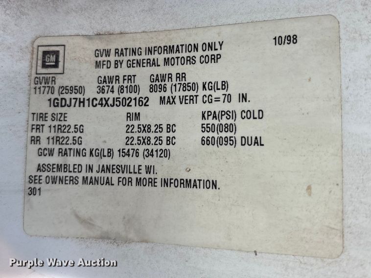 image for item FC2156 1999 GMC C7 flatbed truck