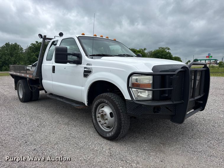 image for item DO8512 2010 Ford F-350 Super Duty Ext. Cab flatbed pickup truck