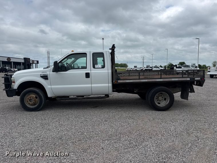 image for item DO8512 2010 Ford F-350 Super Duty Ext. Cab flatbed pickup truck