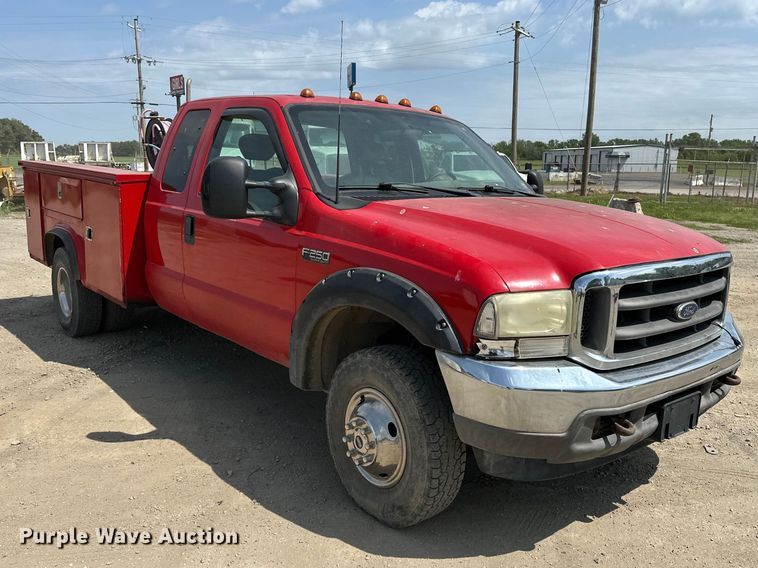 image for item EA4880 1999 Ford F250 Super Duty Ext. Cab utility bed pickup truck