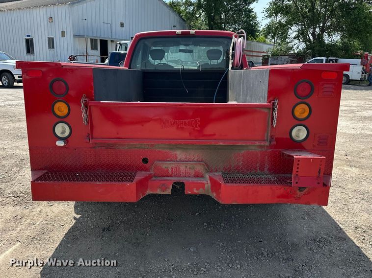 image for item EA4880 1999 Ford F250 Super Duty Ext. Cab utility bed pickup truck