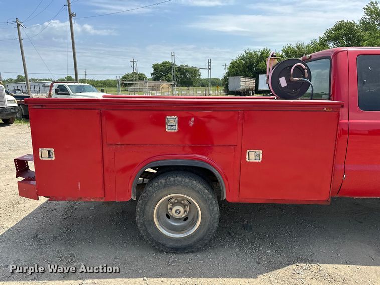 image for item EA4880 1999 Ford F250 Super Duty Ext. Cab utility bed pickup truck
