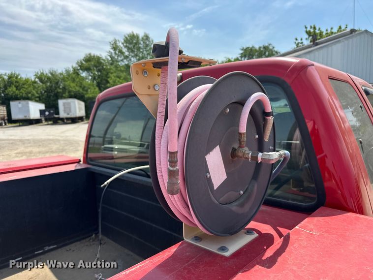 image for item EA4880 1999 Ford F250 Super Duty Ext. Cab utility bed pickup truck
