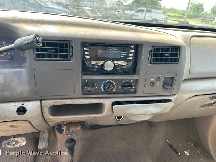 image for item EA4880 1999 Ford F250 Super Duty Ext. Cab utility bed pickup truck