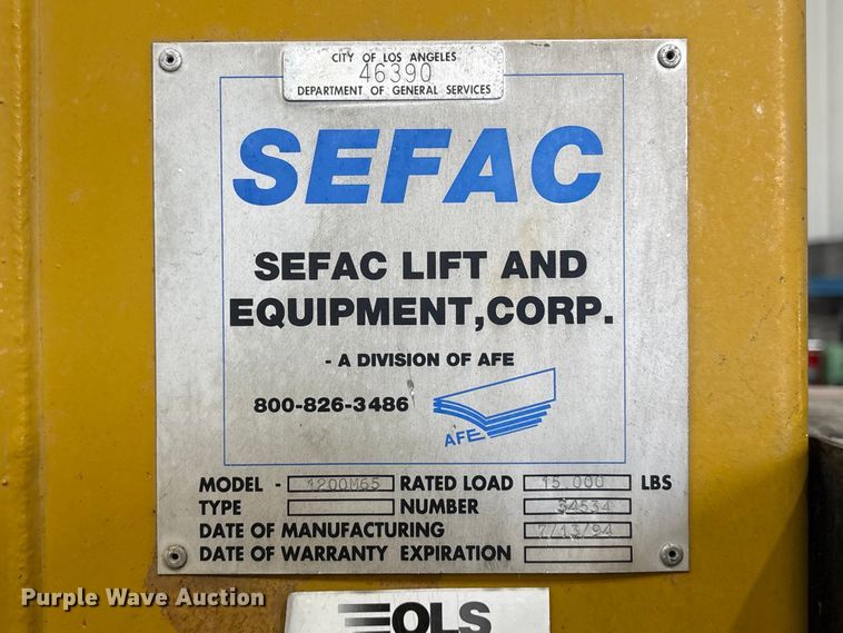 image for item EI5837 1994 Sefac 1200M65 four post automotive lift