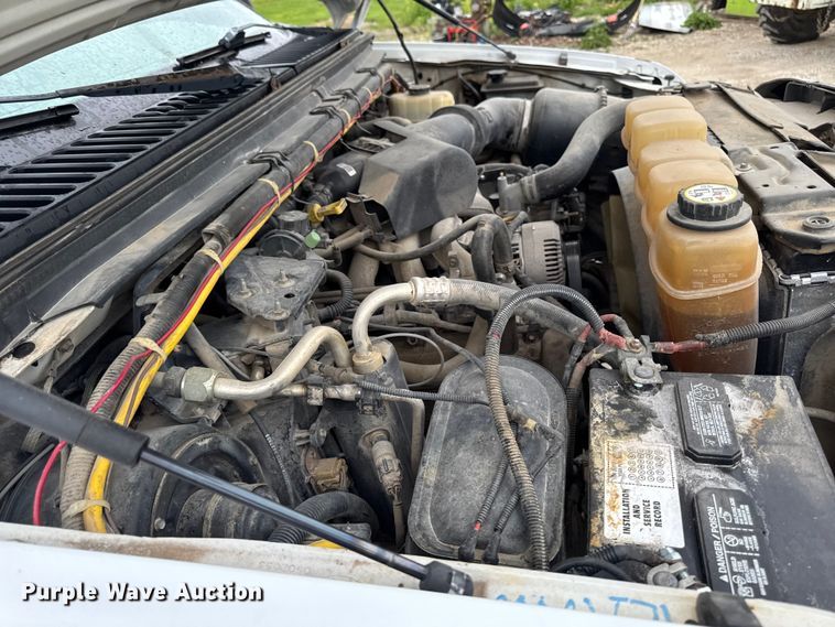 image for item ER0494 2004 Ford F550 Super Duty Crew Cab dump truck