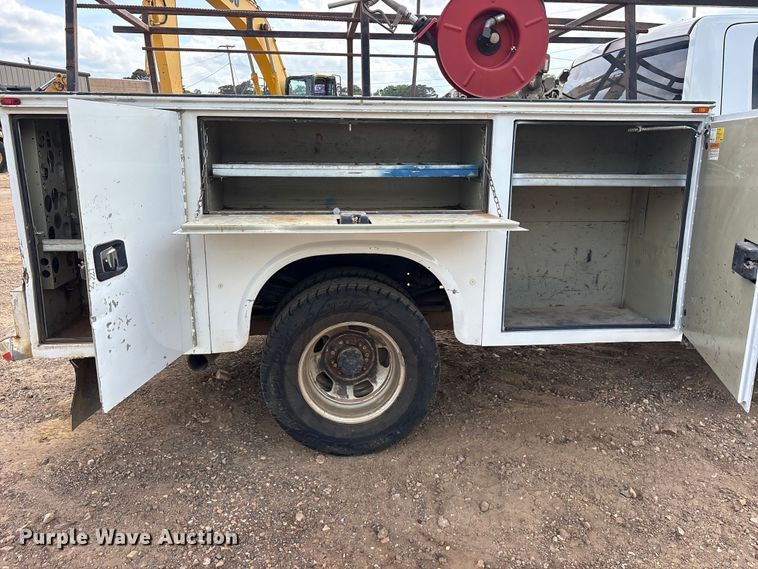 image for item ET2046 2017 RAM 3500 Crew Cab utility bed pickup truck