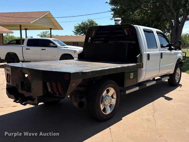 image for item EU5563 2006 Ford F350 Super Duty Crew Cab flatbed pickup truck