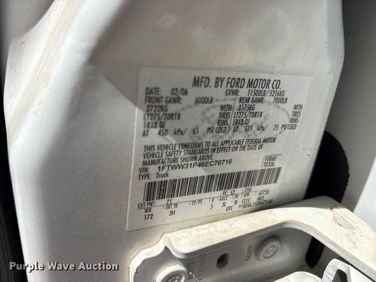 image for item EU5563 2006 Ford F350 Super Duty Crew Cab flatbed pickup truck
