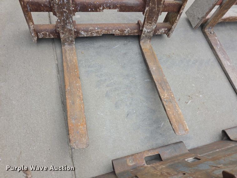 image for item EV2133 (3) skid steer attachments