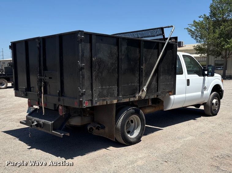 image for item EW0058 2012 Ford F350 Super Duty Ext. Cab dump bed pickup truck