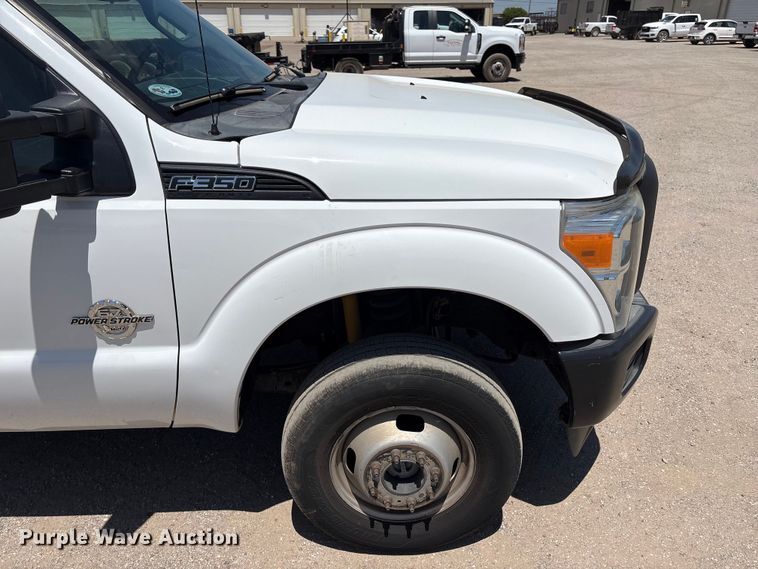 image for item EW0058 2012 Ford F350 Super Duty Ext. Cab dump bed pickup truck