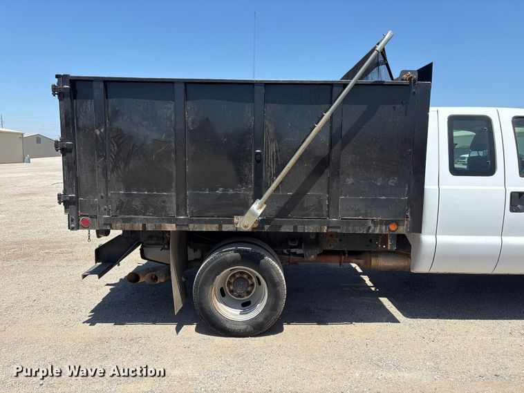 image for item EW0058 2012 Ford F350 Super Duty Ext. Cab dump bed pickup truck