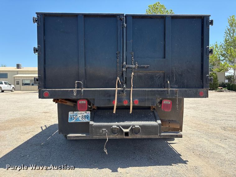 image for item EW0058 2012 Ford F350 Super Duty Ext. Cab dump bed pickup truck