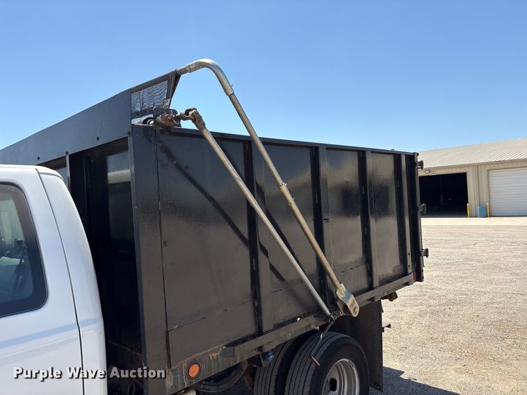 image for item EW0058 2012 Ford F350 Super Duty Ext. Cab dump bed pickup truck
