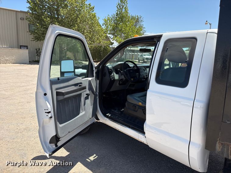 image for item EW0058 2012 Ford F350 Super Duty Ext. Cab dump bed pickup truck