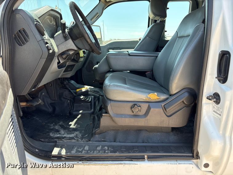 image for item EW0058 2012 Ford F350 Super Duty Ext. Cab dump bed pickup truck