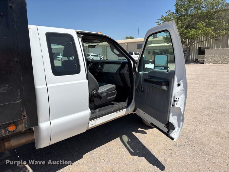 image for item EW0058 2012 Ford F350 Super Duty Ext. Cab dump bed pickup truck