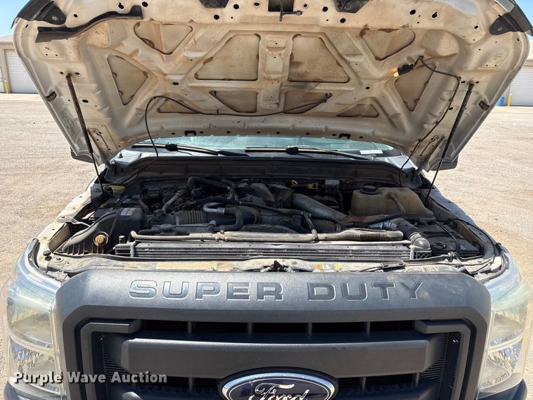 image for item EW0058 2012 Ford F350 Super Duty Ext. Cab dump bed pickup truck