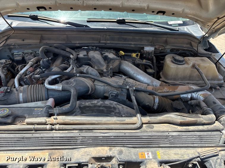 image for item EW0058 2012 Ford F350 Super Duty Ext. Cab dump bed pickup truck