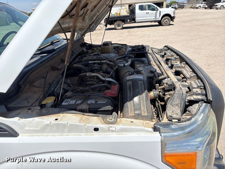 image for item EW0058 2012 Ford F350 Super Duty Ext. Cab dump bed pickup truck