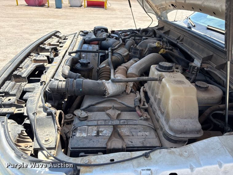 image for item EW0058 2012 Ford F350 Super Duty Ext. Cab dump bed pickup truck