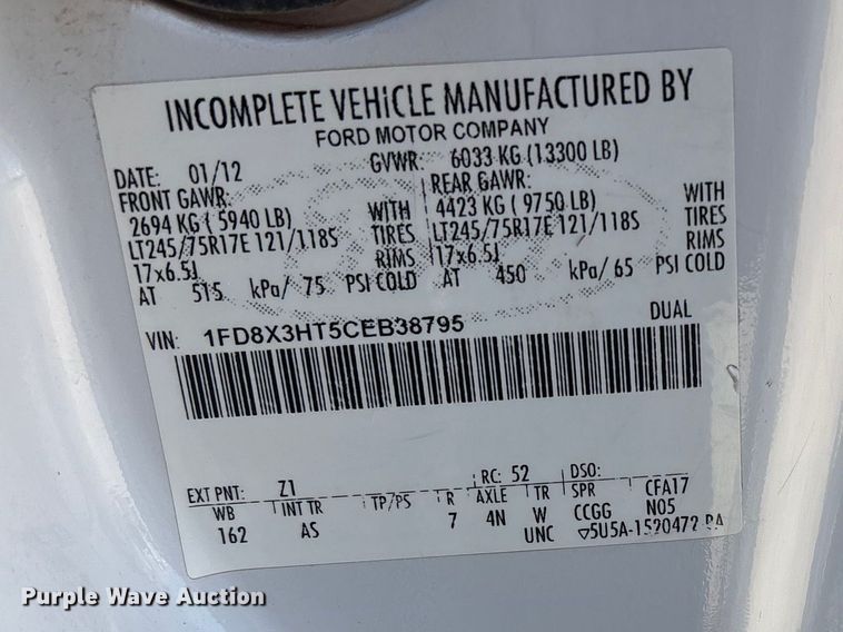 image for item EW0058 2012 Ford F350 Super Duty Ext. Cab dump bed pickup truck
