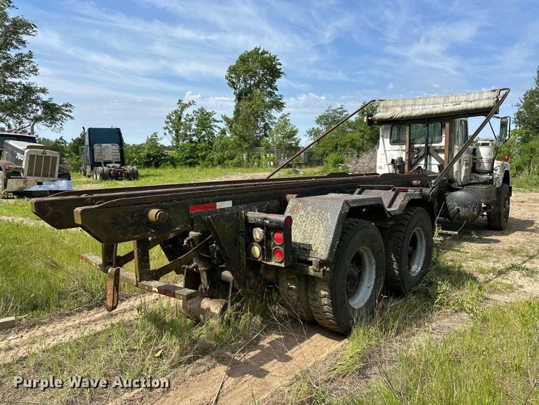 image for item EA4883 1987 Mack DM685S roll-off container truck