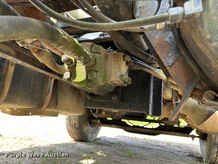 image for item EA4883 1987 Mack DM685S roll-off container truck