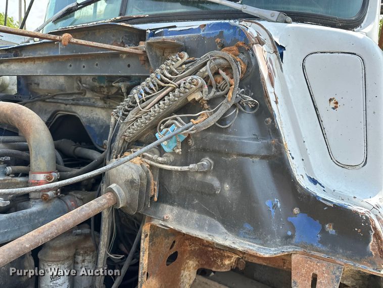 image for item EA4883 1987 Mack DM685S roll-off container truck