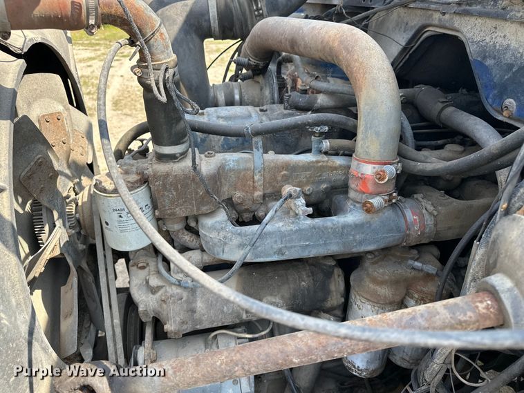 image for item EA4883 1987 Mack DM685S roll-off container truck
