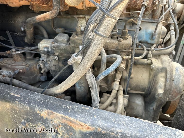 image for item EA4883 1987 Mack DM685S roll-off container truck
