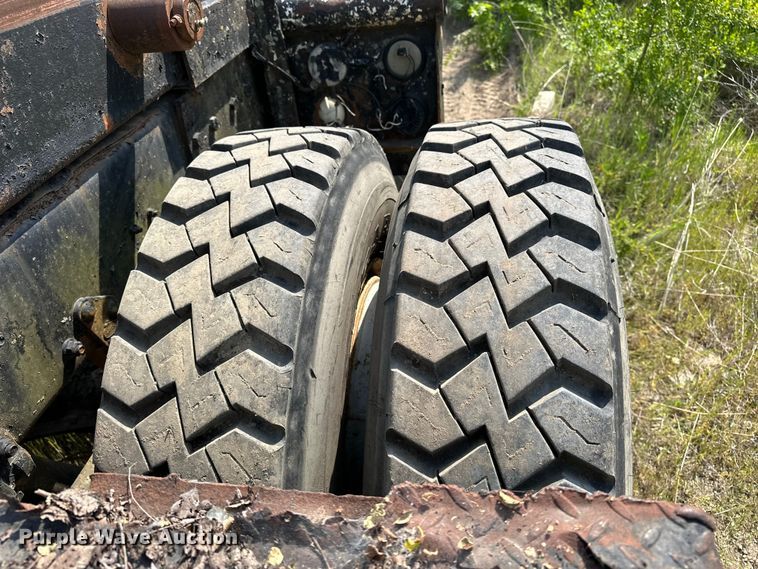 image for item EA4883 1987 Mack DM685S roll-off container truck