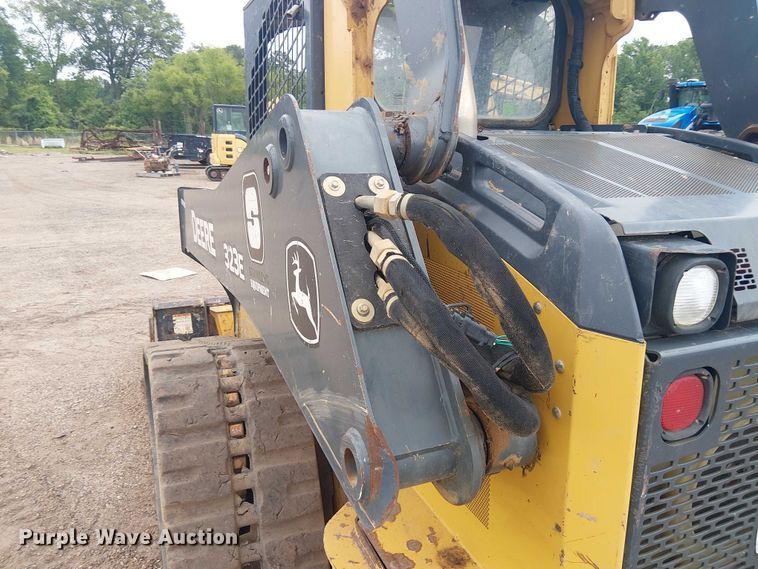 image for item ET2027 2017 John Deere 323E tracked skid steer loader