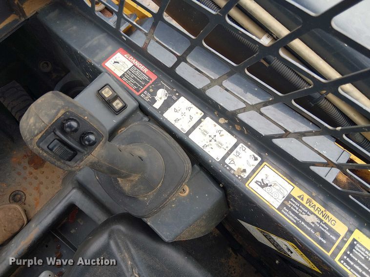 image for item ET2027 2017 John Deere 323E tracked skid steer loader