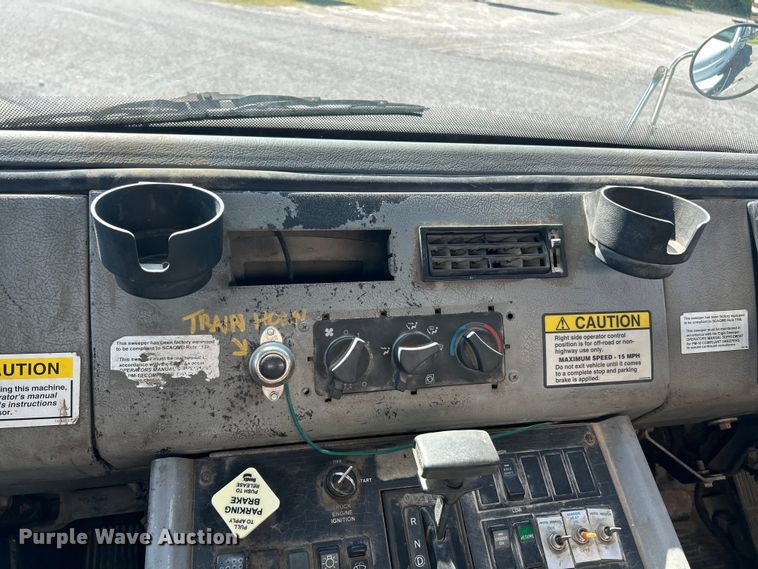 image for item FC2526 2005 Freightliner FL70 street sweeper truck