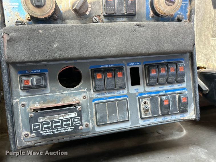 image for item FC2526 2005 Freightliner FL70 street sweeper truck